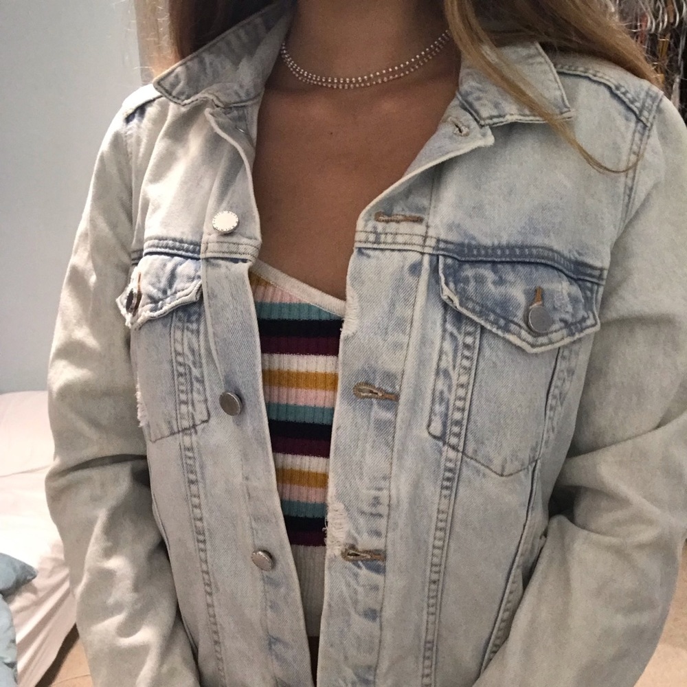 Distressed denim jacket